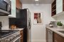 https://www.relatedrentals.com/sites/default/files/styles/image_gallery_thumbnail/public/2022-11/Tate-Studio-Kitchen_staged_by_roomroom.jpg?h=9d58e190&itok=qDR-BpnC