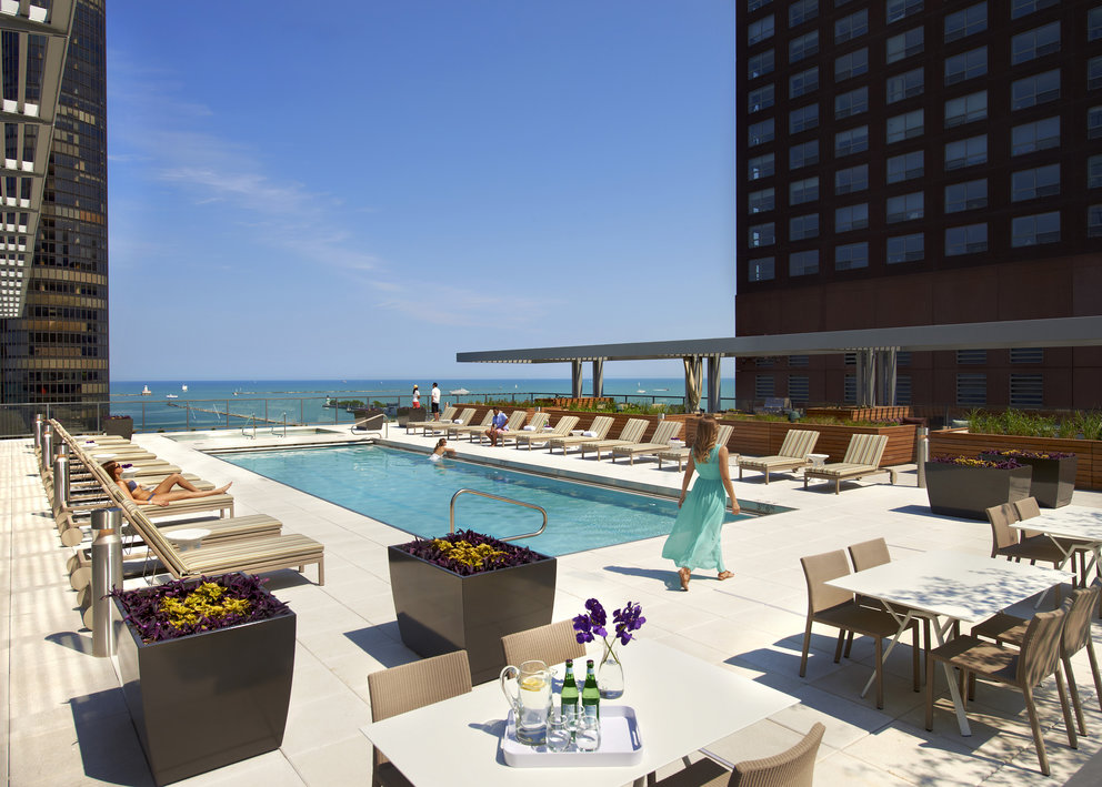 Take a dip in the rooftop pool, then enjoy the lake views from under a shaded cabana.