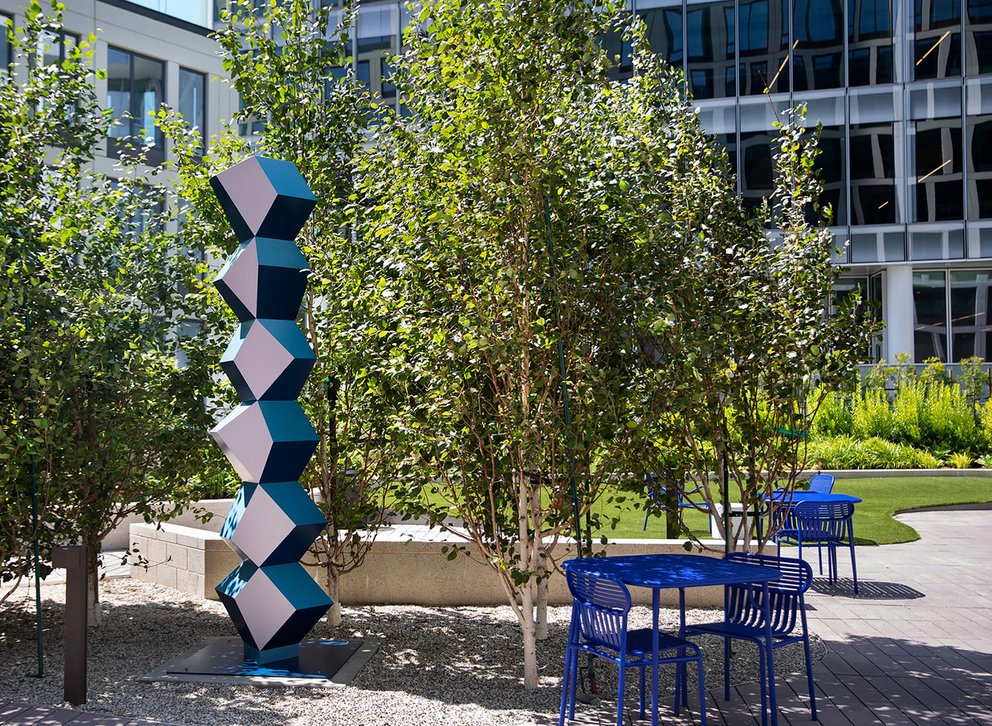 Set amongst the trees in Fifteen Fifty’s private park are two of Angela Bulloch’s colorful and geometric sculptures.