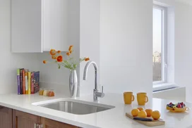 Gourmet kitchens feature stainless steel appliances. 