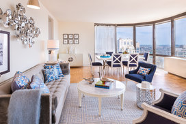Grand layouts with floor-to-ceiling windows feature stunning city views.