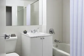 Bathrooms feature luxury finishes.