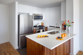 Gourmet kitchens feature stainless steel appliances. 