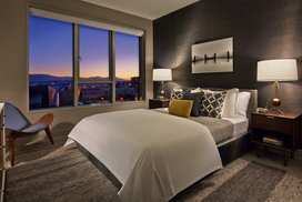 Expansive windows open to sweeping views of Downtown LA and beyond.