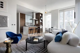 Soaring 10-foot ceilings and grand windows allow for stunning views and light-filled living.