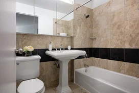 Bathrooms feature luxury finishes.