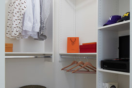 Large walk-in closets with custom shelving.