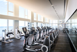 Workout with a lake view at the residents-only fitness club managed by Equinox.