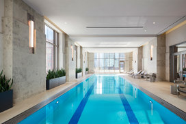 60 ft. indoor pool with access to an outdoor terrace overlooking Bennett Park.