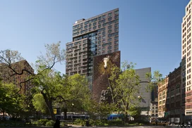 Facade features mixed-media art piece, The Metronome