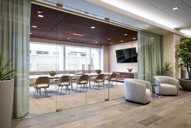 A fully furnished and wired conference room, large enough to comfortably seat tenˇpeople, is available for residents' use.