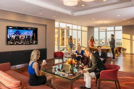 Located on the 20th floor with breathtaking Central Park views, the entertainment lounge features a 20-by-60 foot sitting area, billiards, a walnut paneled bar, and Venato Travertine hearth.