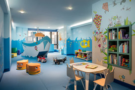 The children's playroom offers families dedicated space for their young explorers to run free, right inside the building.
