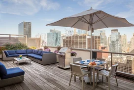 Stunning rooftop includes lounges and BBQ grills.