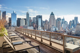 Stunning rooftop includes lounges and BBQ grills.