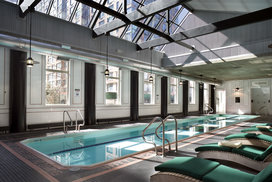 A skylit sixty foot heated swimming pool is adjacent to a state-of-the art health and fitness center. 