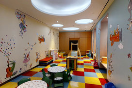Located off the lobby, the children's playroom is designed to delight children.