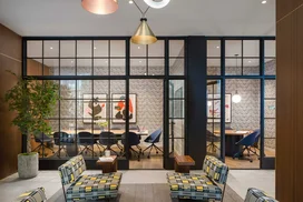 Work from home in the Business Lounge complete with private conference rooms and personal work pods.