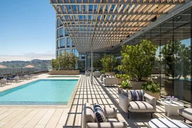 Swim, sunbathe, and socialize with the cityscape and bay as your backdrop on the rooftop pool and sun deck, which also features a hot tub, barbecues, heat lamps and access to the Pool House. 