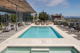 Swim, sunbathe, and socialize with the cityscape and bay as your backdrop on the rooftop pool and sun deck, which also features a hot tub, barbecues, heat lamps and access to the Pool House. 