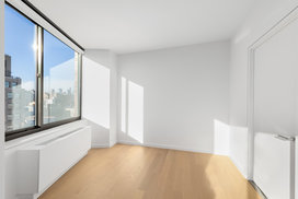 The unit is flooded with light as it features oversized windows and generous layouts.