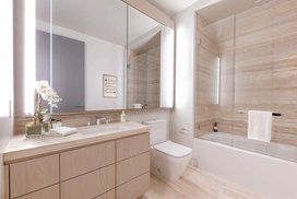 Immaculately finished bathrooms are serene, personal retreats