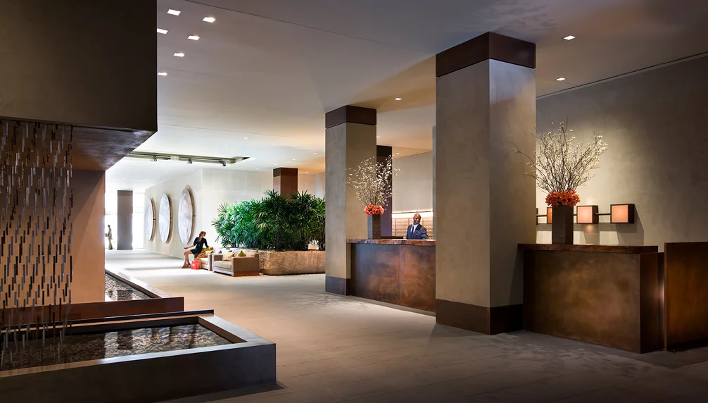 The lobby is a calming haven thanks to nature-inpsired design by Clodagh and the 24-hour concierge and doorman.