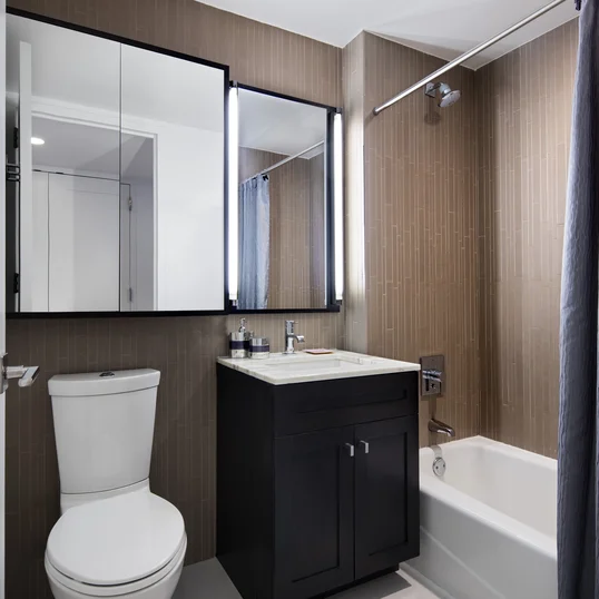 Custom bathrooms with oversized custom medicine cabinets.