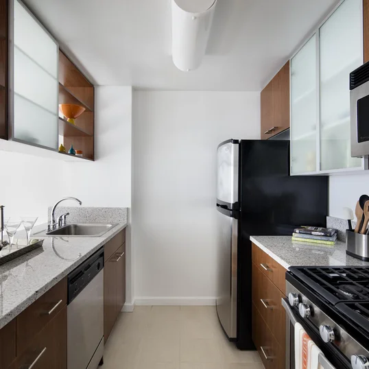 Gourmet granite kitchens with European-style glass door cabinetry, ceramic tile floors and stainless steel appliances will bring out your inner chef.