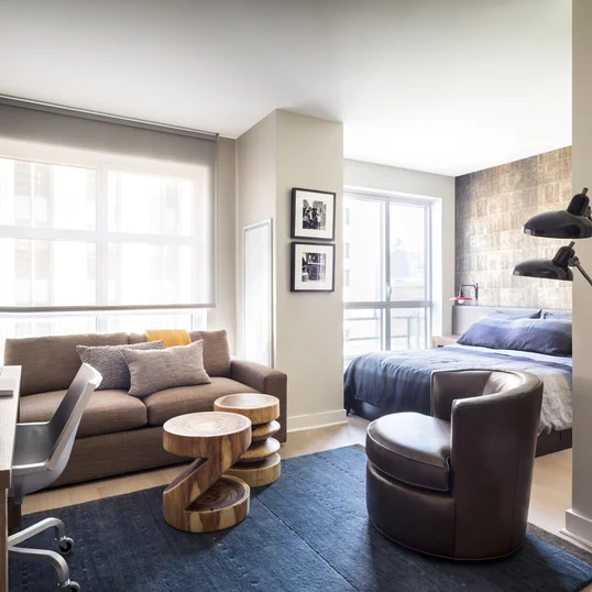 Enjoy sweeping views of the High Line, the Empire State Building, Tribeca, and the Hudson River through floor-to-ceiling windows.