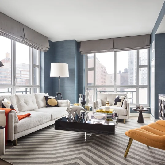 Enjoy sweeping views of the High Line, the Empire State Building, Tribeca, and the Hudson River through floor-to-ceiling windows.