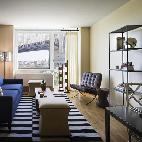 Open living and dining areas filled with light.