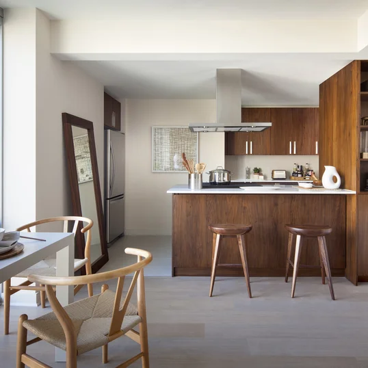 Gourmet Kitchens with stainless steel appliances and custom wood cabinetry