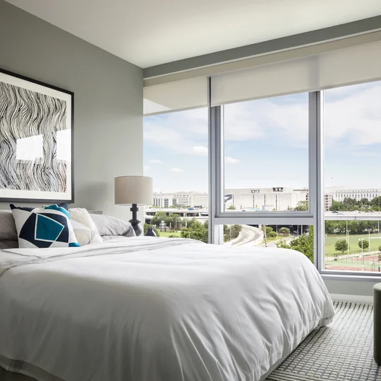 One Hill South offers gracious, light-filled bedrooms. 