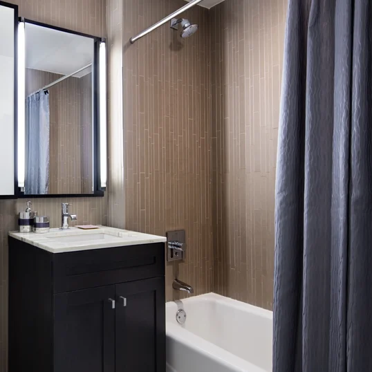 Custom bathrooms with oversized custom medicine cabinets.