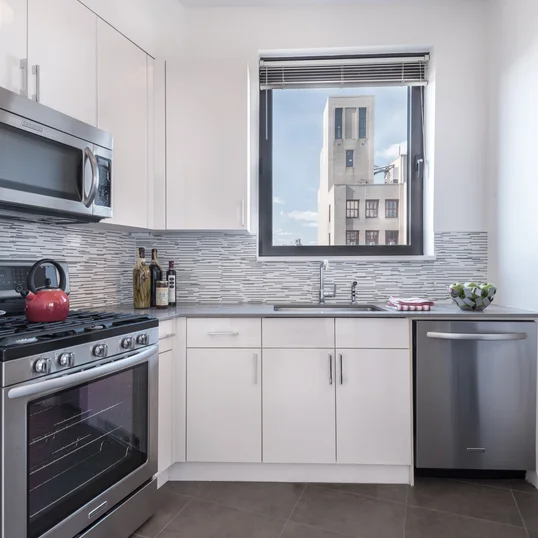 The gourmet kitchens at One Union Square South features Euro-style cabinetry and granite countertops.