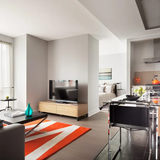 Floor to ceiling windows with sweeping city views