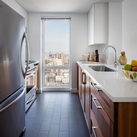 Gourmet kitchens feature stainless steel appliances. 
