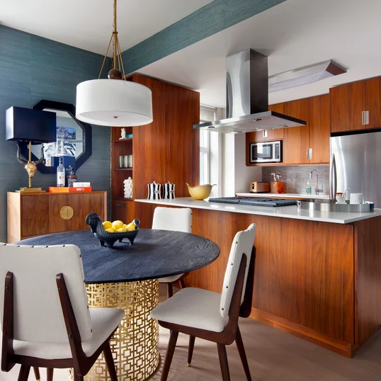 Gourmet kitchens include walnut cabinetry, Caesarstone countertops, and stainless steel KitchenAid® appliances.