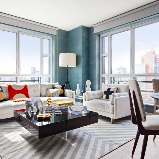 Enjoy sweeping views of the High Line, the Empire State Building, Tribeca, and the Hudson River through floor-to-ceiling windows.