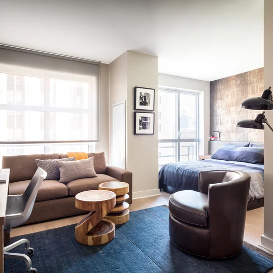 Enjoy sweeping views of the High Line, the Empire State Building, Tribeca, and the Hudson River through floor-to-ceiling windows.