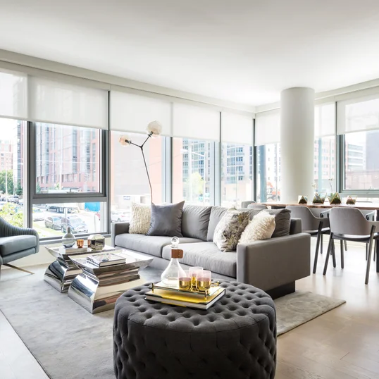 Large windows offer light-filled living with spectacular city views