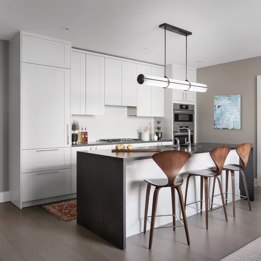 Kitchens feature Subzero built-in refrigerator, bottom mount freezer, Bosch Benchmark appliances including electric oven, gas cooktop, integrated dishwasher and microwave drawer.