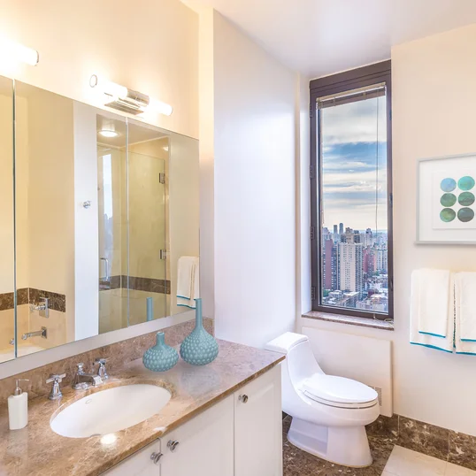 Lavish baths with polished marble floors and vanities provide unmatched luxury.