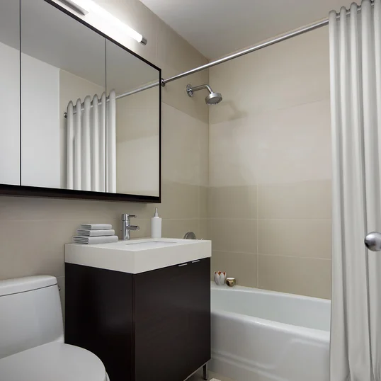 These luxury apartments feature baths with marble top vanities and large-sized mirrors.