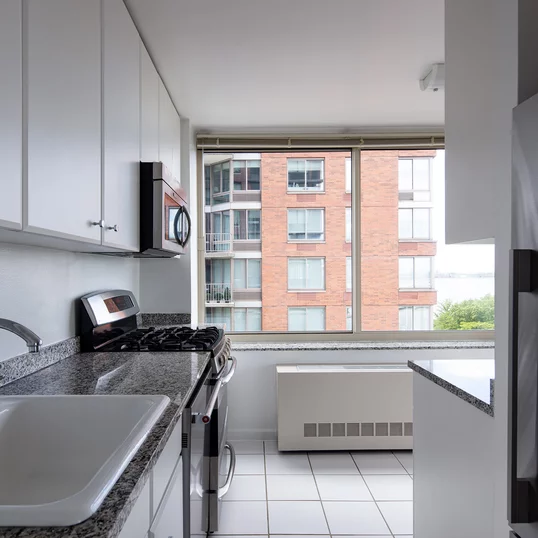 The gourmet kitchens at Tribeca Park include GE appliances and granite countertops.