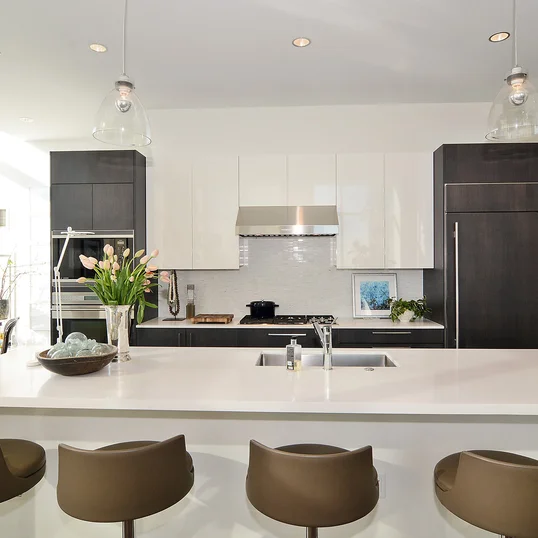 Gourmet kitchens with Snaidero duotone cabinetry and quartz countertops