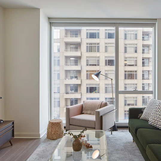 Custom-designed wide-plank wood flooring throughout residences