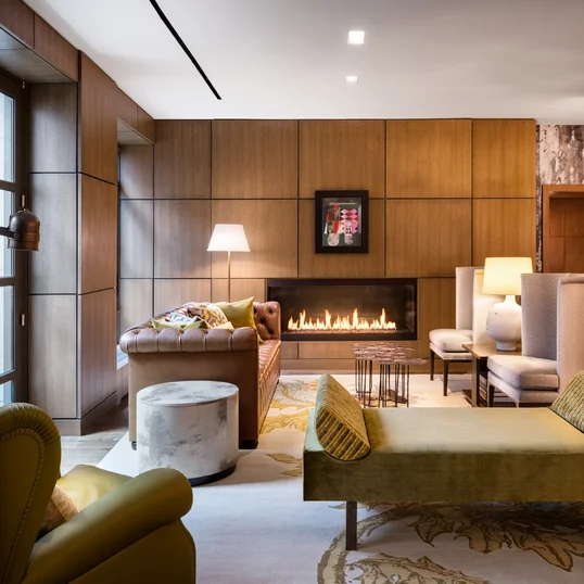 Relaxing library with fireplace.