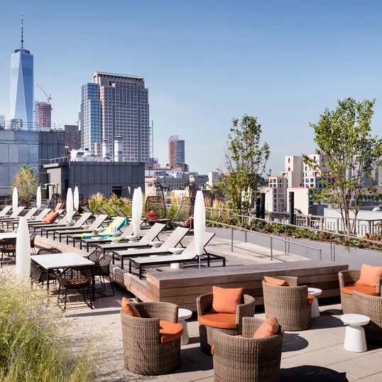 HMWhite's design includes grilling stations and chaise lounges to relax against a stunning backdrop.